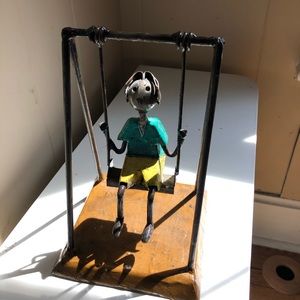 Artwork. Phenomenal and well made. Boy in swing